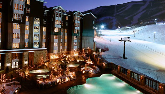 You can sit in the jacuzzi while watching your friends ski by!
